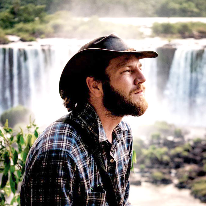 Alex Farlander working as a tour leader near Iguazu Falls